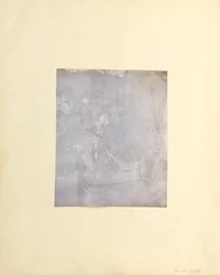 Profilporträt eines sitzenden Mannes mit einem Buch